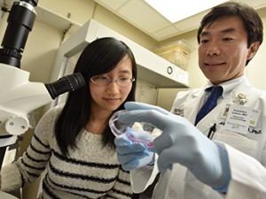 Fumihiko Urano, MD, PhD with graduate student