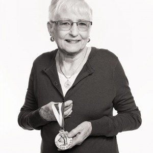 elizabeth-tarbox-black-white-holding-medal-Dec14